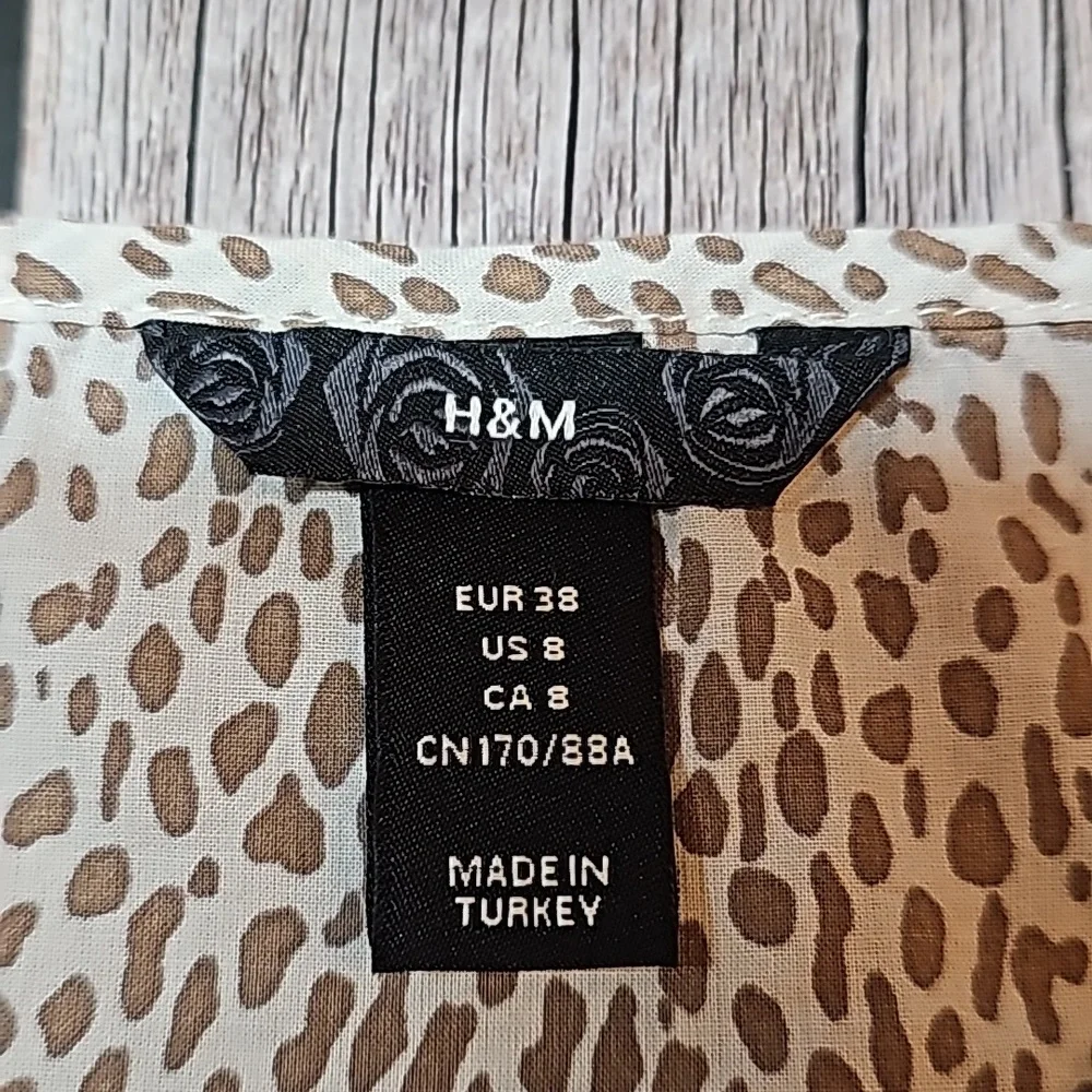 H&M LEOPARD PRINT SHORT SLEEVE TIERED PULLOVER TOP BLOUSE - Picture 10 of 13